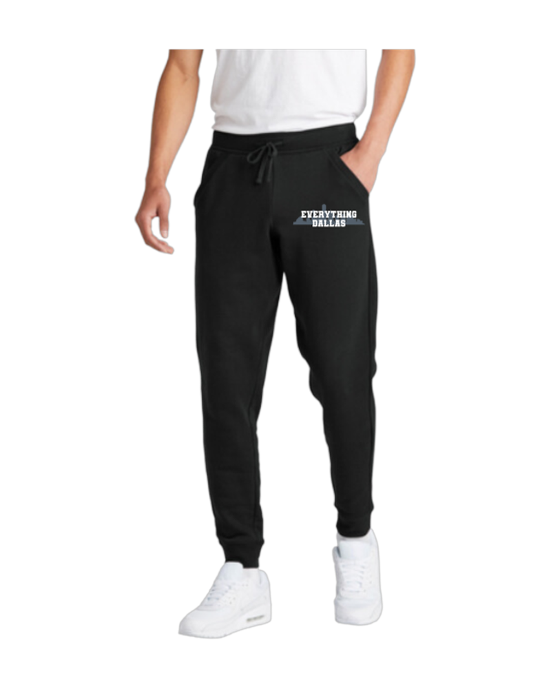 Black joggers, left-leg skyline print